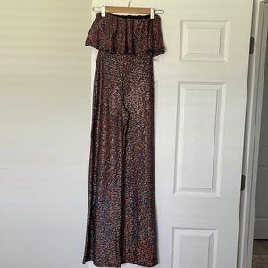 Bell bottom romper, never worn. Bought for Nashville but was to small.